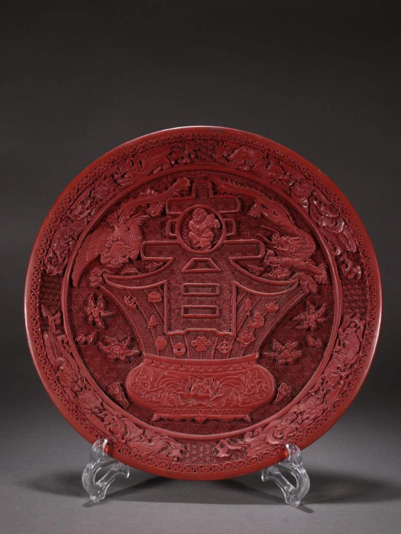 A Rare Cinnabar lacquer 'Dragon and Pheonix' Dish: A Rare Cinnabar lacquer 'Dragon and Pheonix' Dish Size:H:3cm L:30cm W:878g (The dimensions of all batches are manually measured.If you need more detailed information, please contact our customer servi
