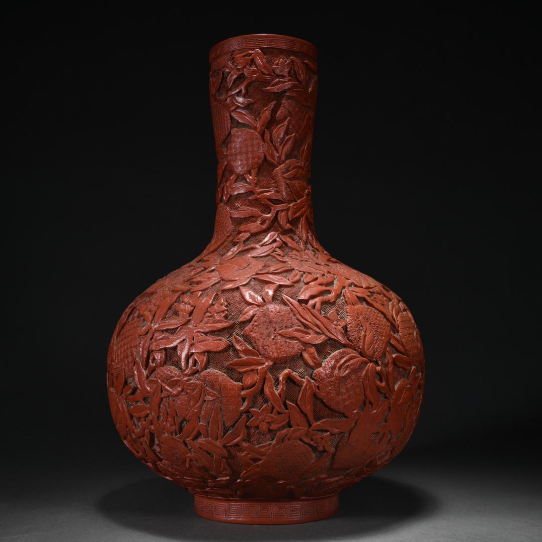 An Unusual Cinnabar Lacquer 'Flowers' Bottle: An Unusual Cinnabar Lacquer 'Flowers' Bottle Size:H:40.5cm L:25cm W:1773g (The dimensions of all batches are manually measured.If you need more detailed information, please contact our customer servic