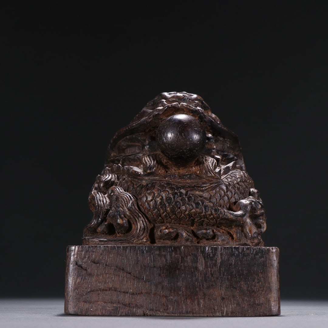 A Very Rare and Larger Agarwood Dragon Button Seal (1 of 9)