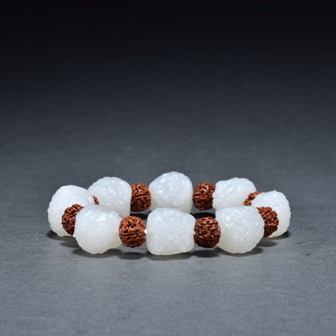 A String of Rare Hetian Jade Carved Lion Head Beads (1 of 9)