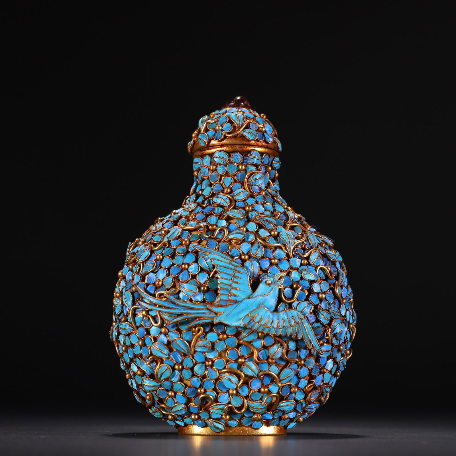 A silver gold-plated emerald flower and bird patterned snuff bottle (1 of 9)