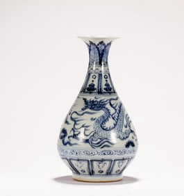 A blue and white dragon patterned bottle