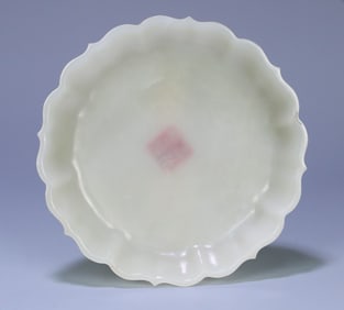 A piece of Qing Hetian jade lotus plate