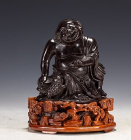 A piece of rosewood figure ornament