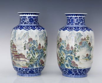 A pair of Qianlong enamel blue and white entwined branches, landscape pavilions, figure patterned