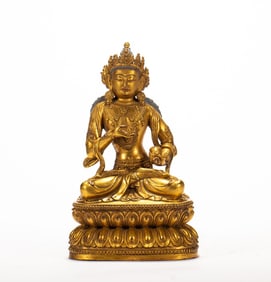 A copper gilded Buddha statue
