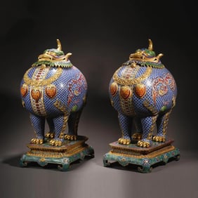 A pair of pinched wire enamel Elephant Ear smoked stove