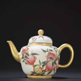 A pink painted gold Fu Shou Kang Ning teapot