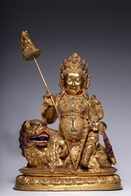 A copper gilded gold inlaid turquoise agate treasure statue of the Heavenly King