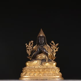 A bronze gilded statue of Zongkaba