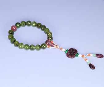 18 pieces of palace green tourmaline held in hand