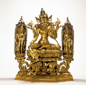 A copper gilded Buddha statue