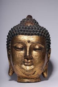 A Ming Dynasty bronze clay gold Shakyamuni Buddha head
