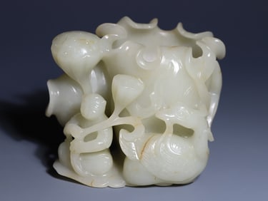 A piece of Hetian jade boy play goose flower arrangement