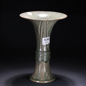 A Song Dynasty celadon carved flower vase