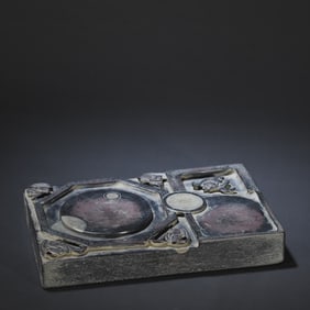 A vintage stone carving with a lucky inkstone in front of me