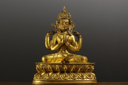 A Tibetan Bronze Gilt Four-Armed Statue Of Guanyin