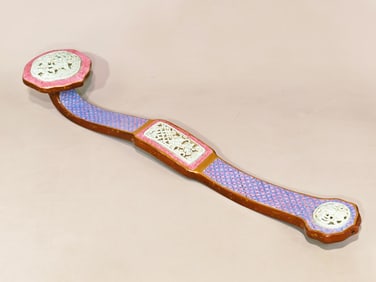 A pink copper coin brocade pattern with hollowed out and auspicious design