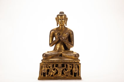 A copper gilded Buddha statue