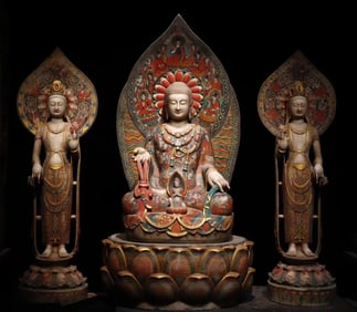 A set of white marble painted Buddha statues in the Northern Qi Dynasty