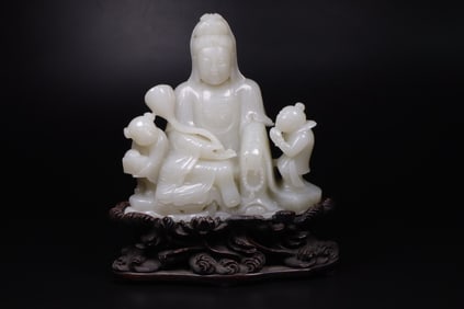 A piece of Hetian seed material boy worship Guanyin ornaments