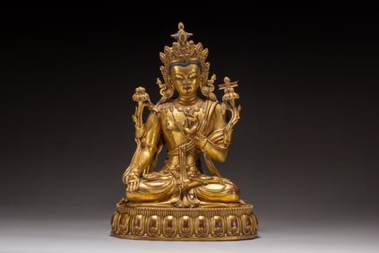 A copper gilded Buddha statue