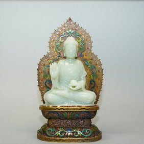 A sitting statue of Sakyamuni Buddha in Hotan Jade
