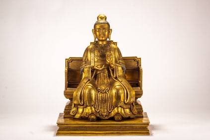 A copper gilded Buddha statue