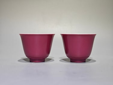 A pair of Yongzheng Imperial pastel carmine inner painted cups