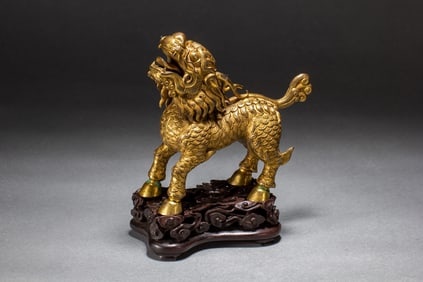 A copper gilded qilin ornament