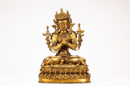A copper gilded Buddha statue