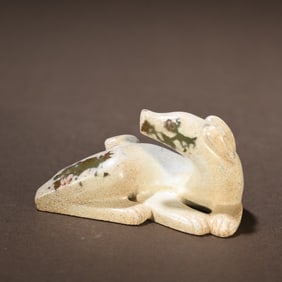 A piece of ancient jade dog ornaments