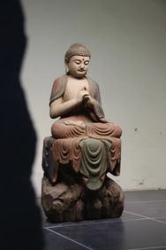 Nanmu carved Sakyamuni seated statue