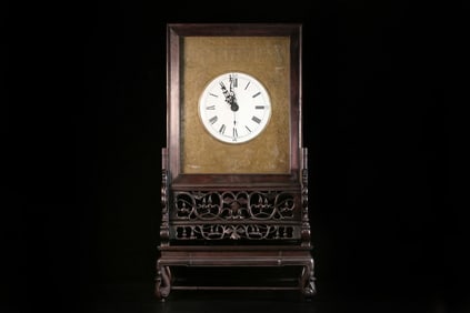 A vintage redwood mechanical clock