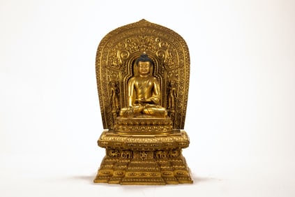 A copper gilded Buddha statue
