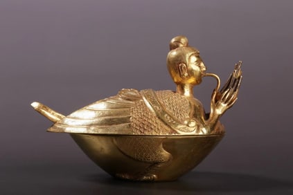 A Tang Dynasty pure gold blown sheng Garuda lid box