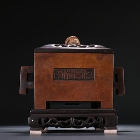 A copper four sided aromatherapy stove produced under the supervision of Xuande in the fifth year