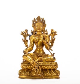 A copper gilded Buddha statue
