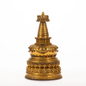 A copper gilded Buddha statue