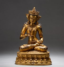 A copper gilded Buddha statue