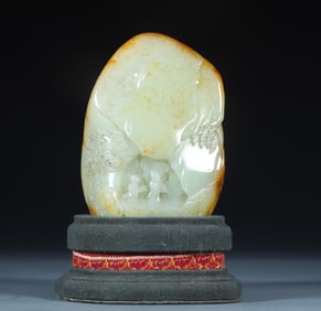 A Hotan Jade ornament for visiting friends with piano