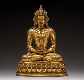 A copper gilded Buddha statue