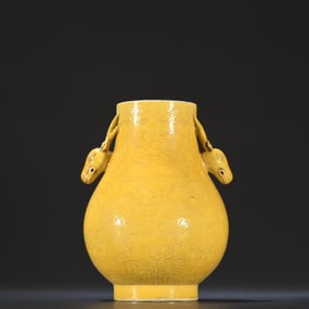 A Qing Kangxi Yellow Glazed Dark Carved Dragon Pattern Deer Ear Zun