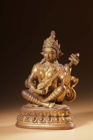 A bronze gilt Miaoyin Guanyin seated statue