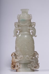 A war Han Hetian white jade beast face pattern double beast ear appreciation bottle