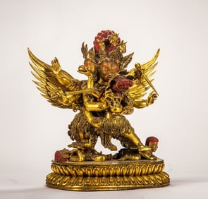 A copper gilded Buddha statue