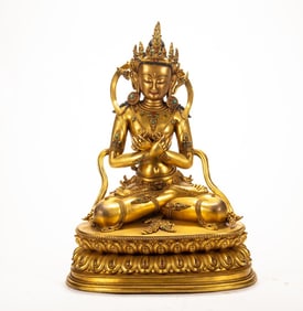 A copper gilded Buddha statue