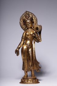A copper gilded gold lotus holding Guanyin