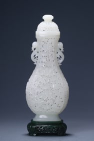 A Hetian white jade hollowed out, entwined flower patterned Ruyi ear vase