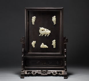 A piece of rosewood inlaid with jade screen